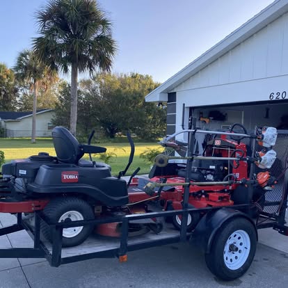 A1 Moto professional Toro and Gravely mowers on trailer